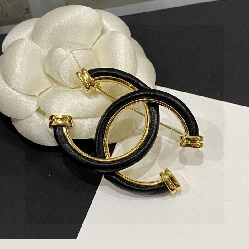 Ch*el brooches
